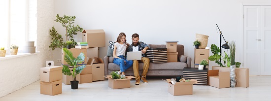 happy young married couple moves to new apartment, apartment moving